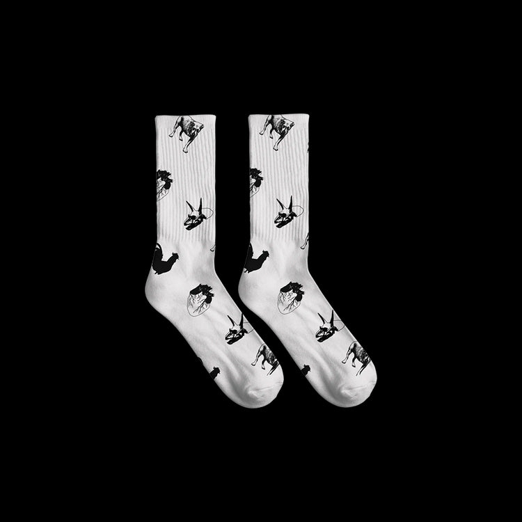 Official Alice in Chains Merchandise. 100% cotton, white knit socks featuring iconic album symbols from Black Gives Way to Blue, Dirt, The Devil Put Dinosaurs Here, and the self titled Alice in Chains.