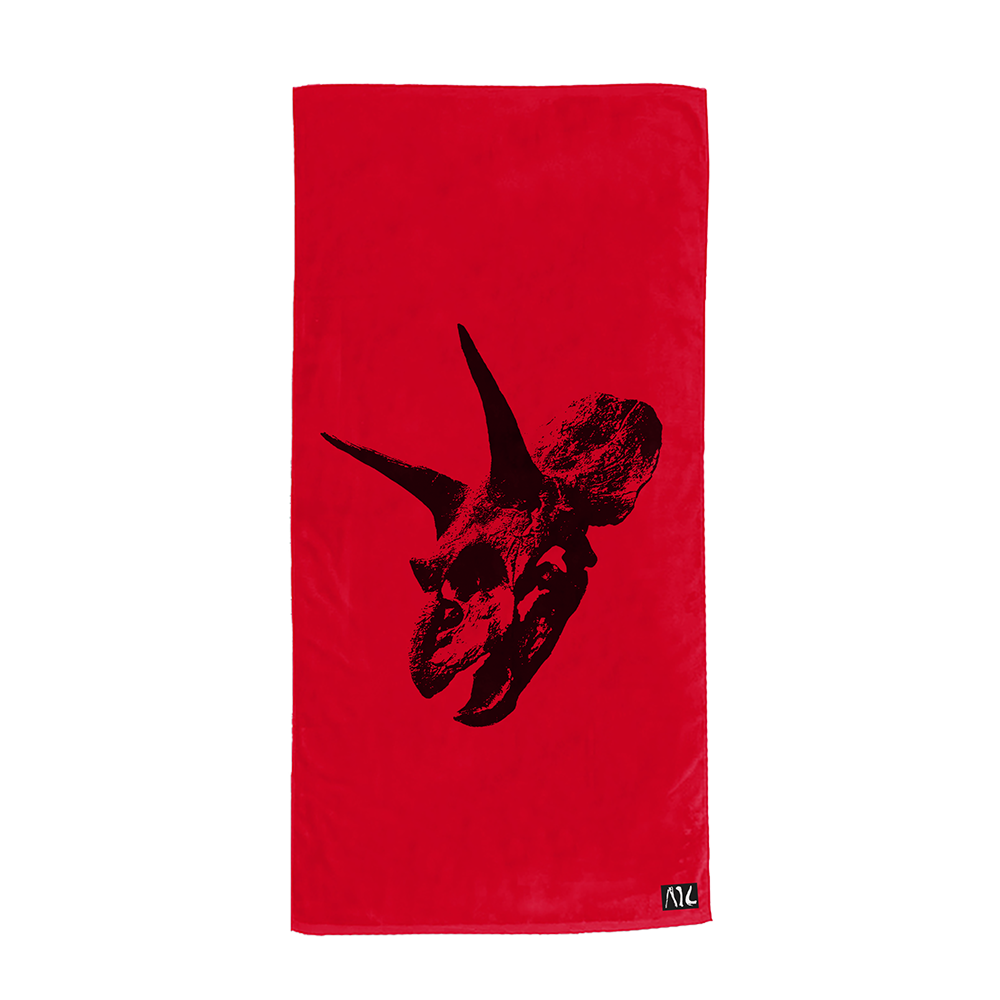 Official Alice In Chains Merchandise. 30"W x 60"H 100% red cotton custom beach towel featuring The Devil Put Dinosaurs Here album skull and a custom sewn AIC logo woven label.