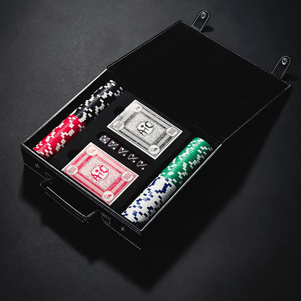 Black leather case containing poker chips and playing cards.